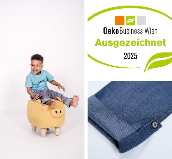 Bild mit Kind und pauakids Hose - Oekobusiness Wien ausgezeichnet