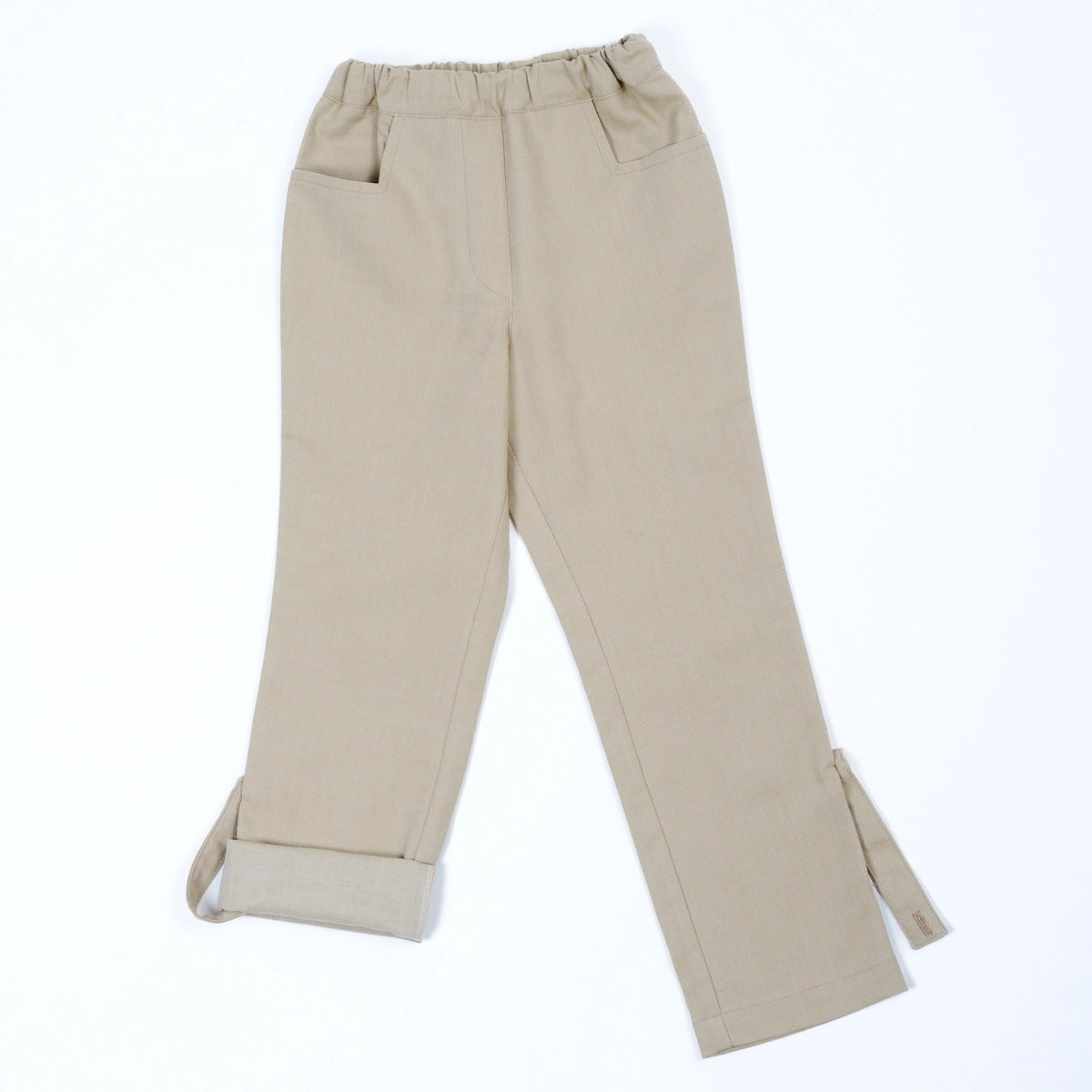 pauakids Mitwachshose beige, ein Bein aufgekrempelt