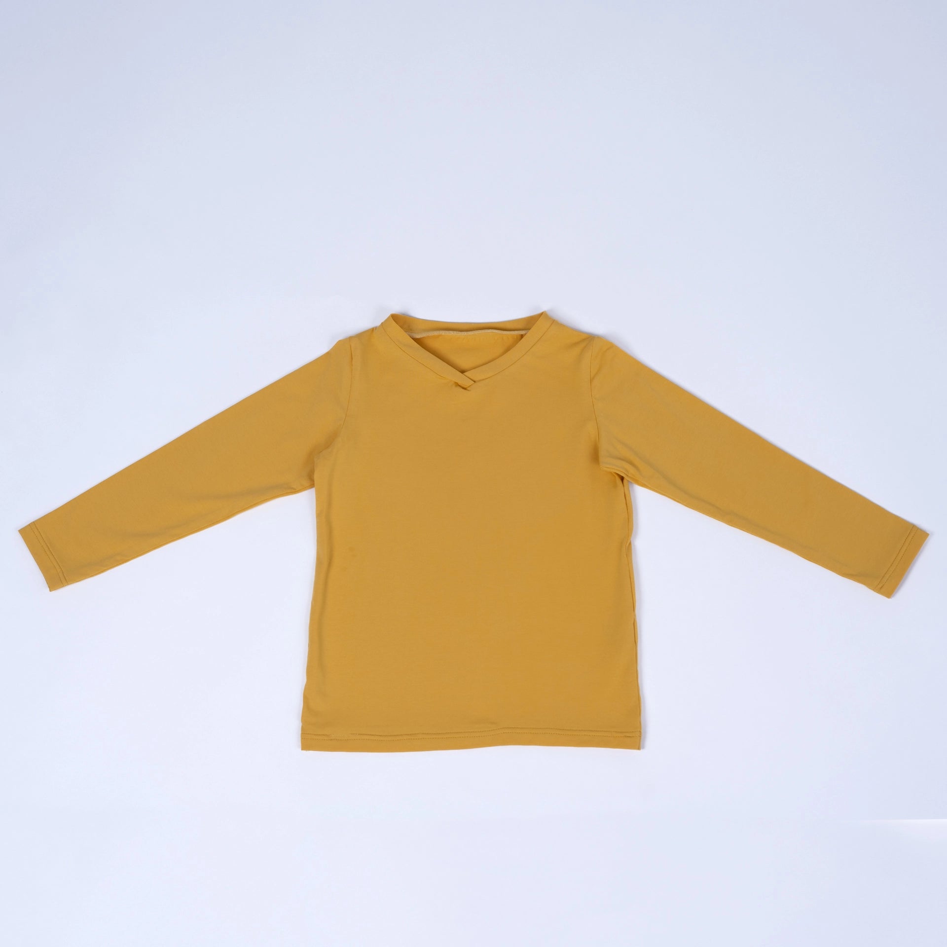 pauakids Unisex Basics Langarmshirt in gelb, Vorderansicht