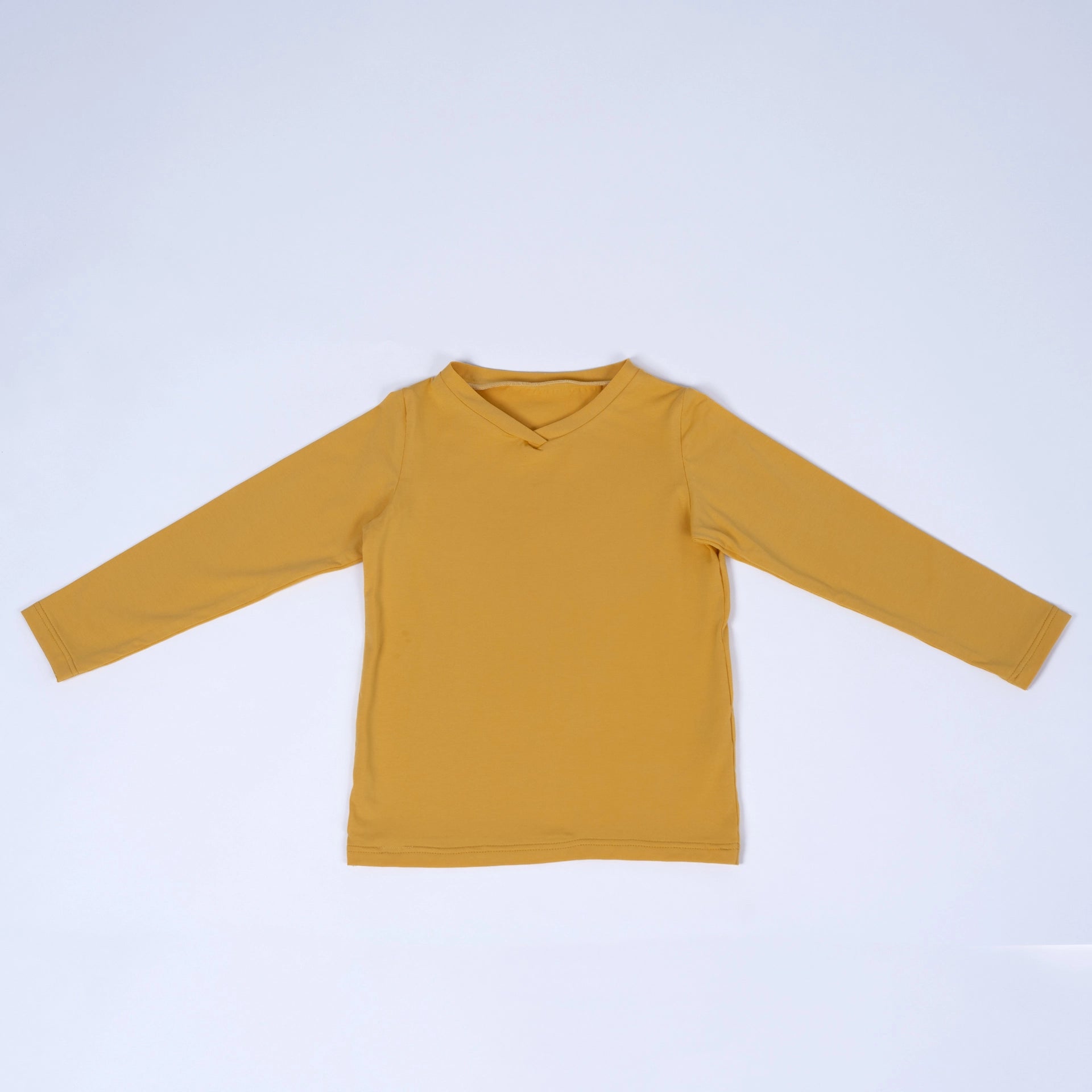 pauakids Unisex Basics Langarmshirt in gelb, Vorderansicht